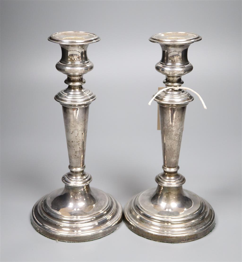 A pair of William IV silver pillar candlesticks, Sheffield 1832, Henry Wilkinson & Co, 23.4cm, weighted.